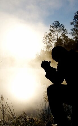 MAN PRAYING
